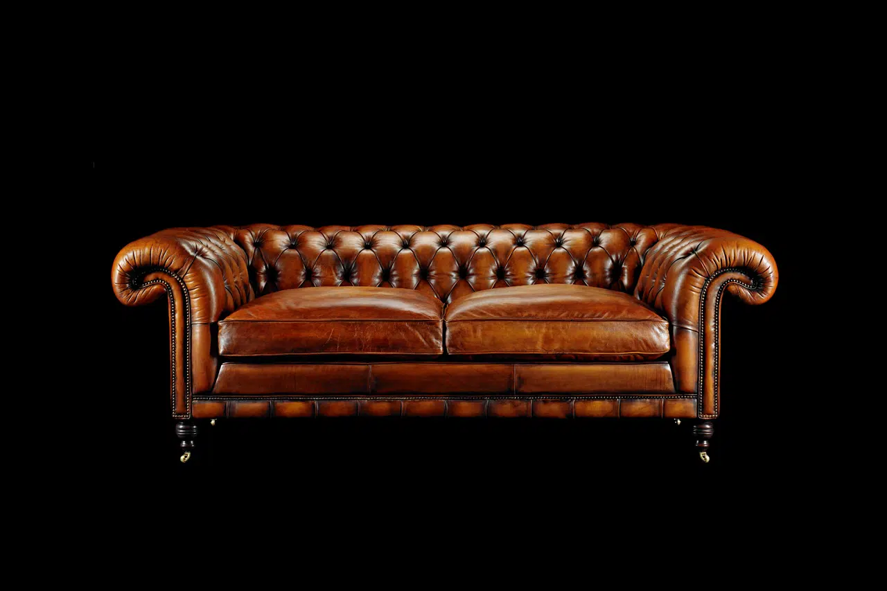 Samuel Johnson grand hand coloured leather tufted sofa