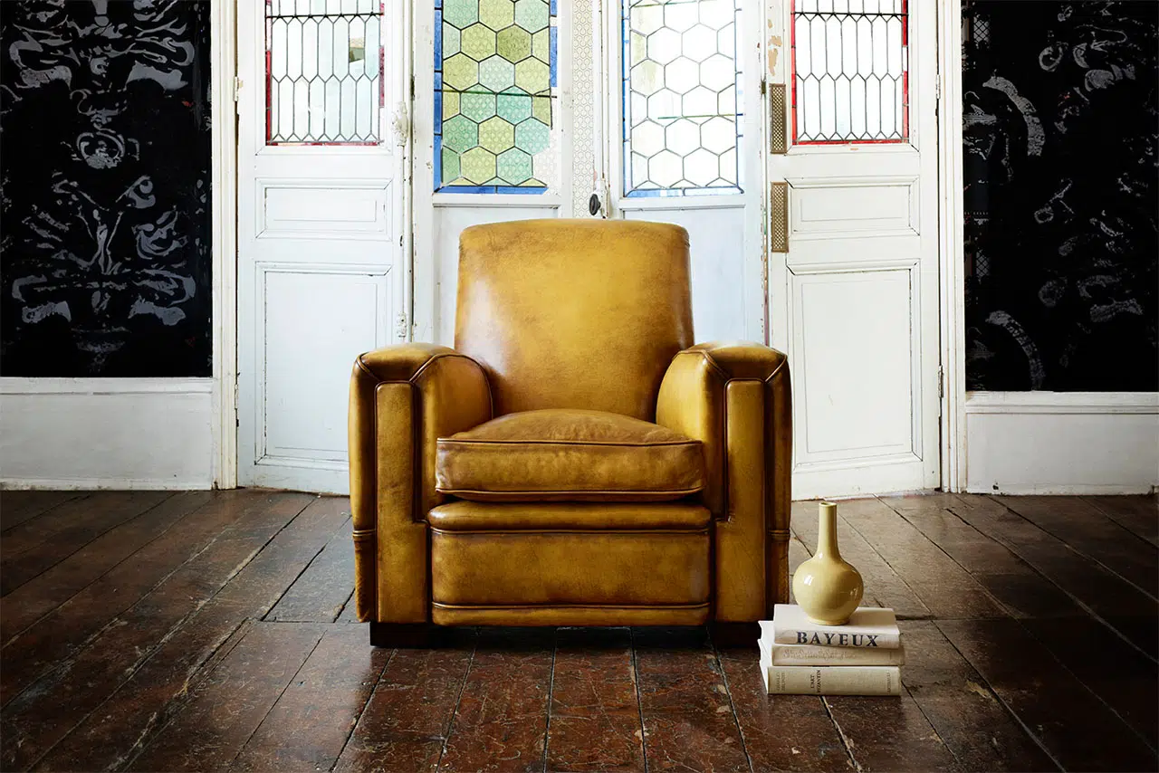 Chop real leather chair embodying comfort centric art deco style