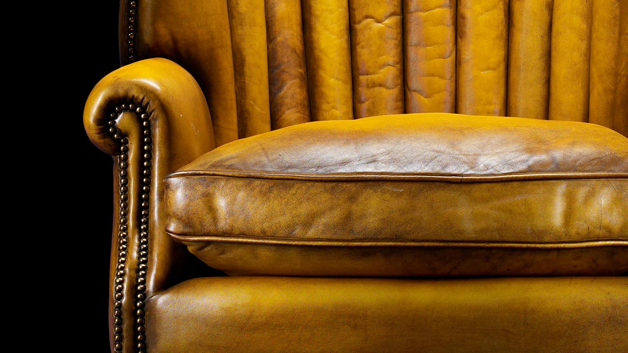 Oliver Goldsmith Gold Leather Sofa