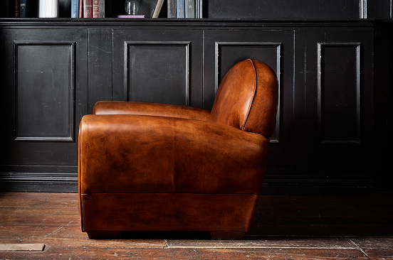 Bowler generously proportioned chair with 1920s style symmetrical curve